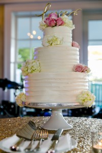 Cakes by Liz provided the couple with a traditional wedding cake and a groom's cake. – Photo by Randi Baird 